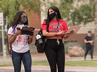 Students don face coverings while on campus on the first day of classes, Aug. 24. Though most classes began in an online format, about 5,000 students attended  essential courses such as research labs, in person. (University Communications, Chris Richards)